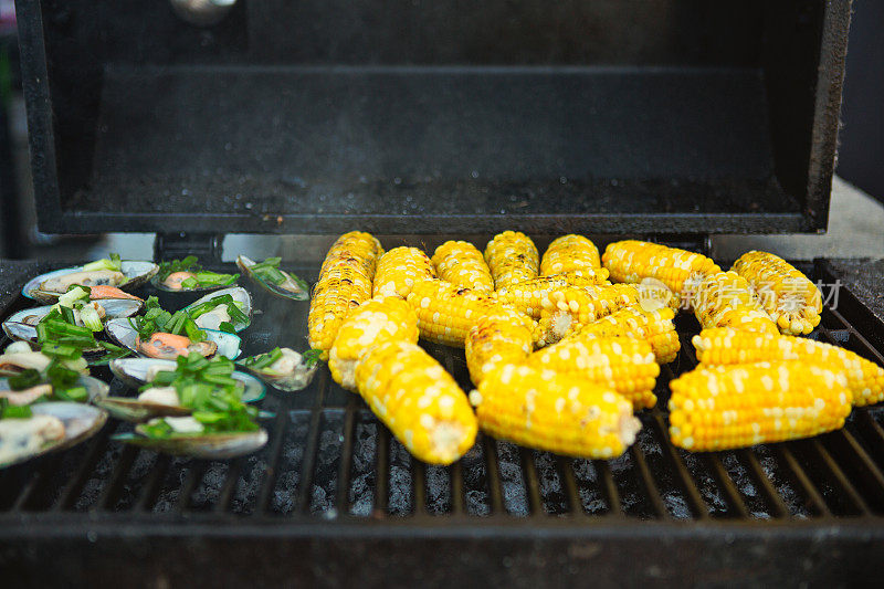 Mussel and corn on grill